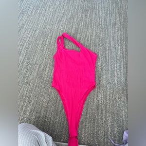 Asymmetrical body suit